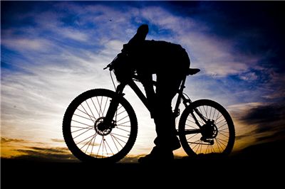Picture Of Mountain And Bicycle Rider