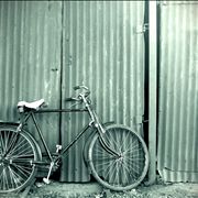 Picture Of Old Bike And Garage Door